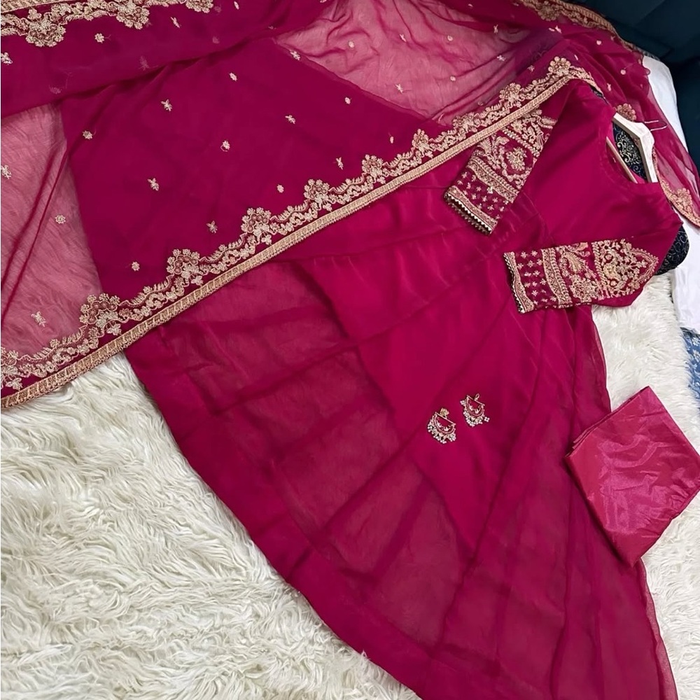 Elegant Magenta Embroidered suit